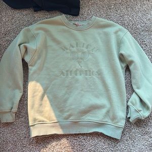 The brand is Bailey rose it is pretty stretchy and fits kind of shorter.